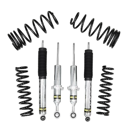 An image showcasing the Bilstein B60 4x4 Lift Kit, including front and rear shock absorbers and coils.