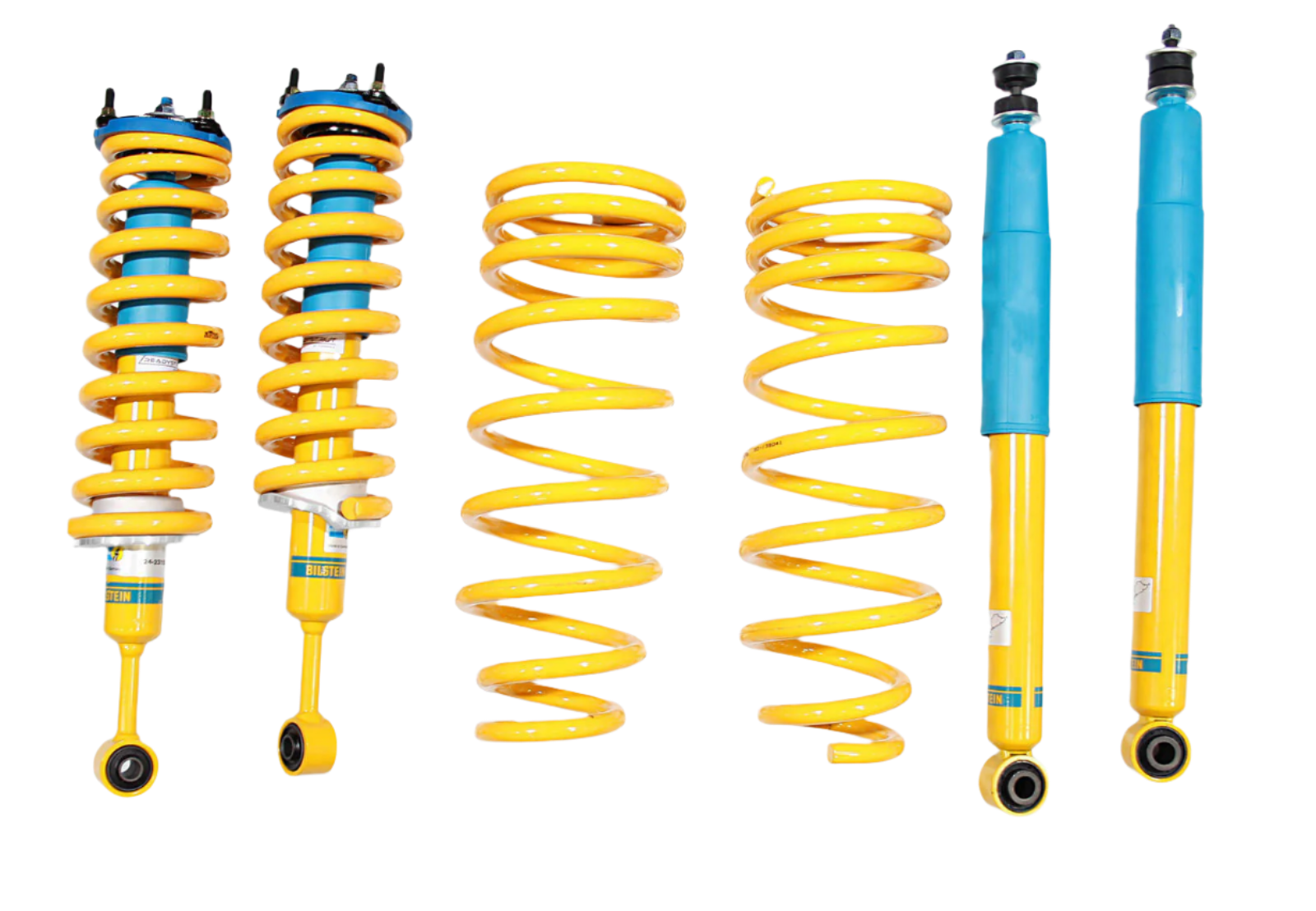 A set of yellow and blue Bilstein shock absorbers and springs for a Ford Everest 2015-2018 4x4 lift kit.