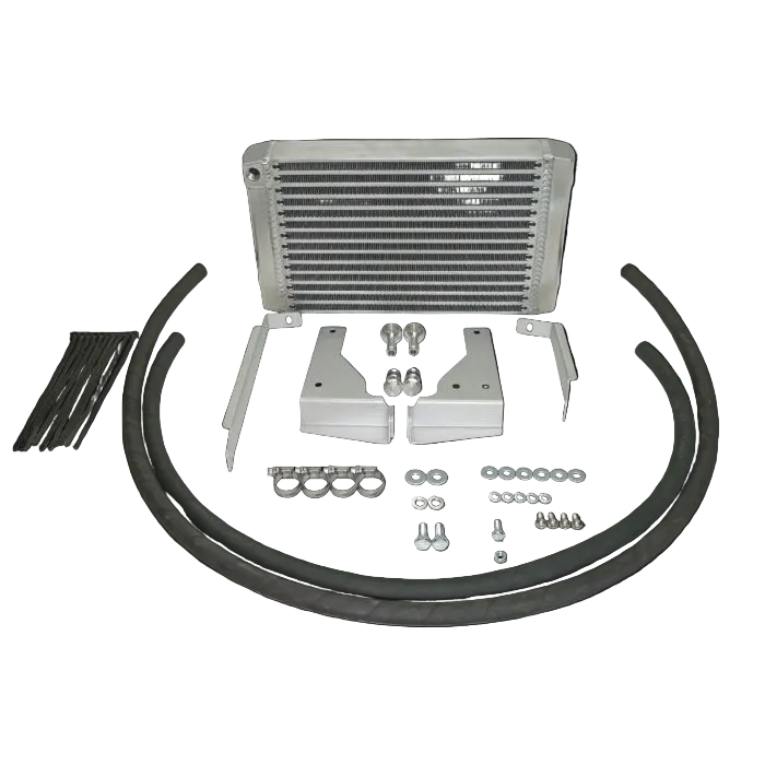 Car intercooler kit with pipes and brackets on a black background