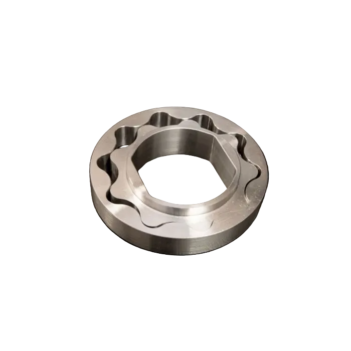 Metallic gear-like object on a black background