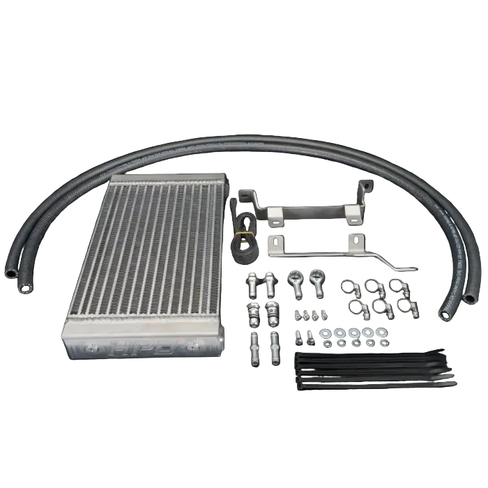 Car oil cooler kit with components on a black background